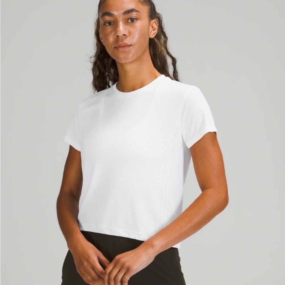 Lululemon Athletica Black Train To Be Short Sleeve Crop Top